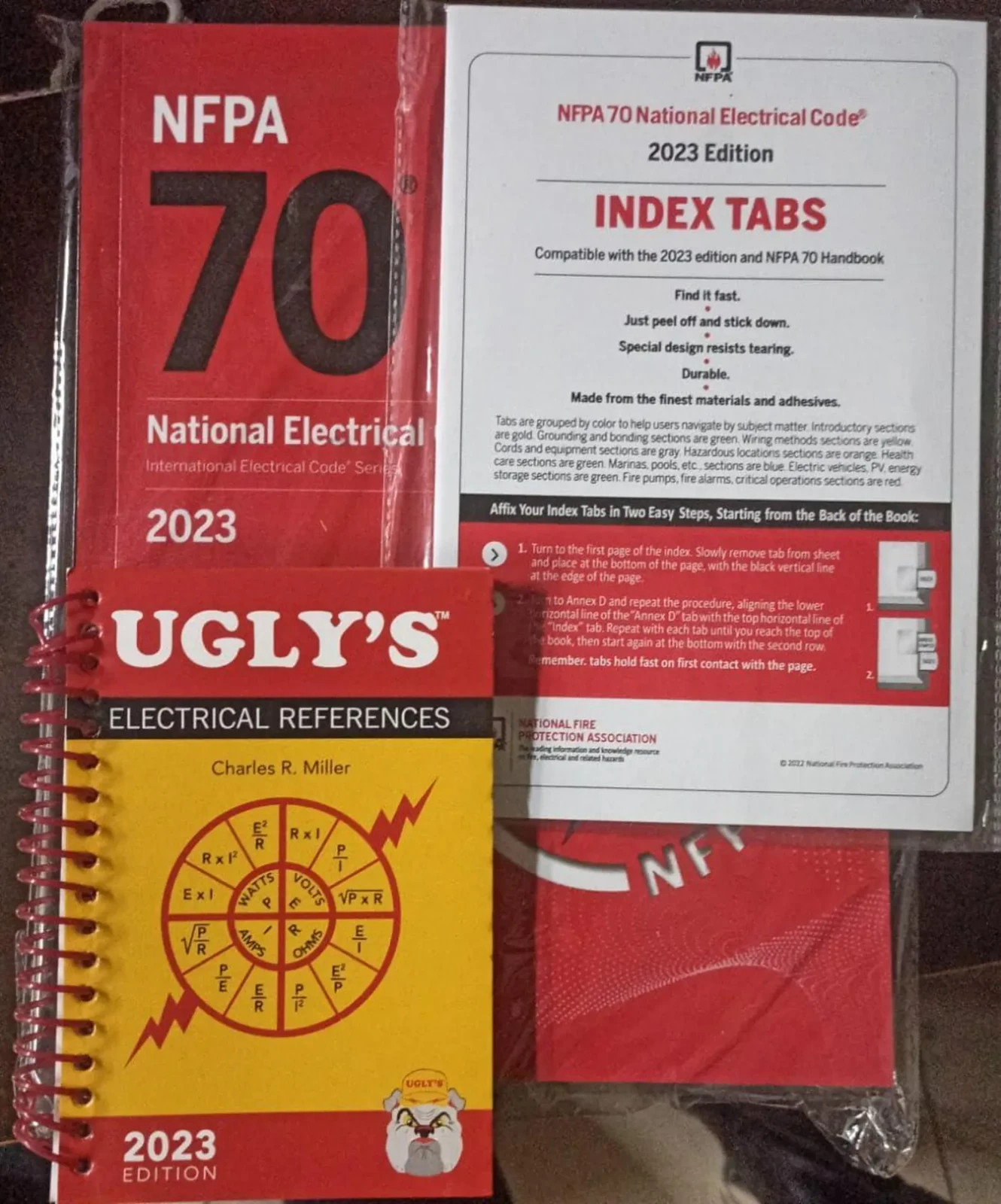 NFPA 70 National Electrical Code 2023 Paperback & Ugly&rsquo;s Electrical & Index Tabs